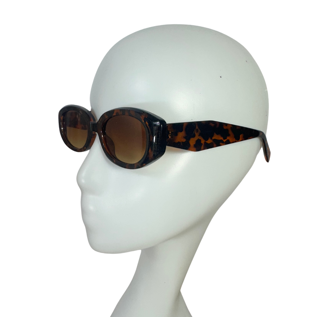 Brown tortoiseshell oval sunglasses
